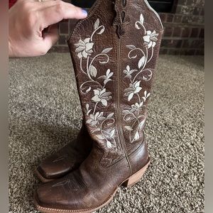 EUC twisted c boots with floral embroidery.